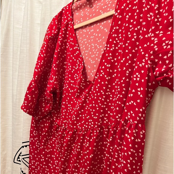 Red dress with white hearts and ruffles on the bottom part of dress. - Picture 4 of 5